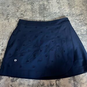 G/FORE navy tennis or gold skort
